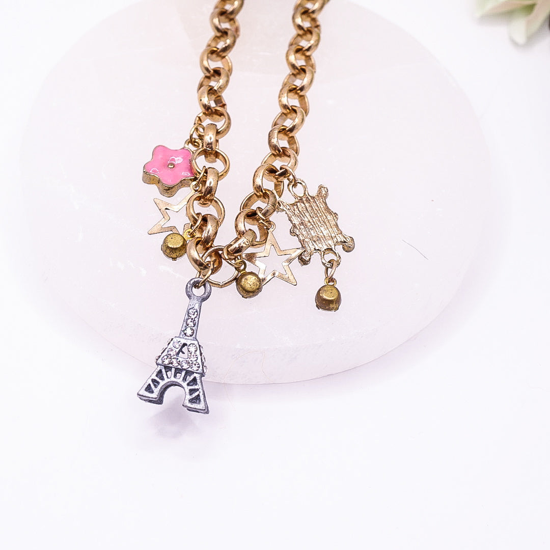 Golden Belcher Chain Toggle Clasp Bracelet with Eiffel Tower, Ace, Stars Charms