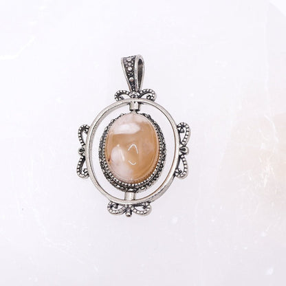 Sakura Agate Rotating Pendant | Intuitively Chosen
