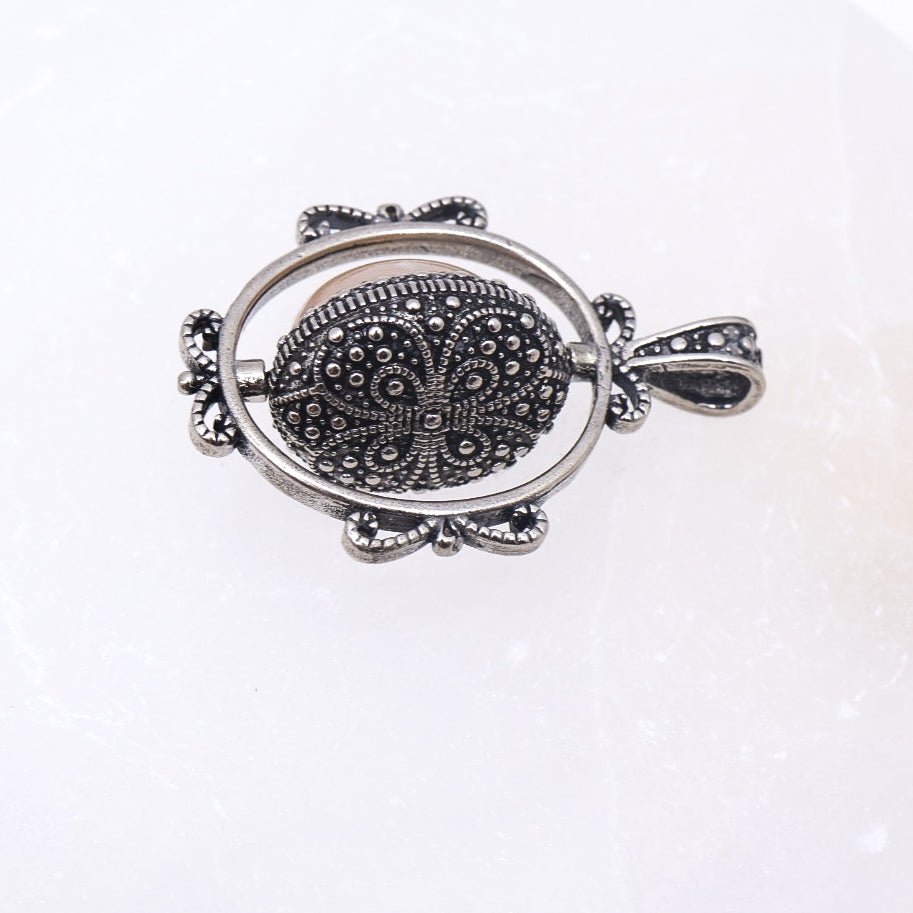 Sakura Agate Rotating Pendant | Intuitively Chosen