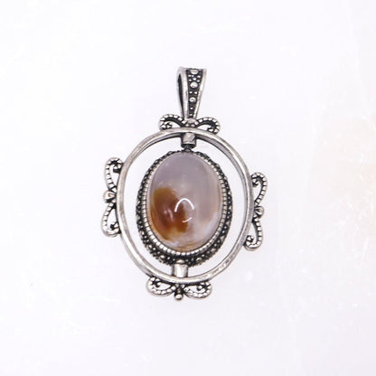 Sakura Agate Rotating Pendant | Intuitively Chosen